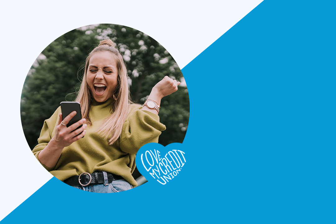 Woman excited looking at phone