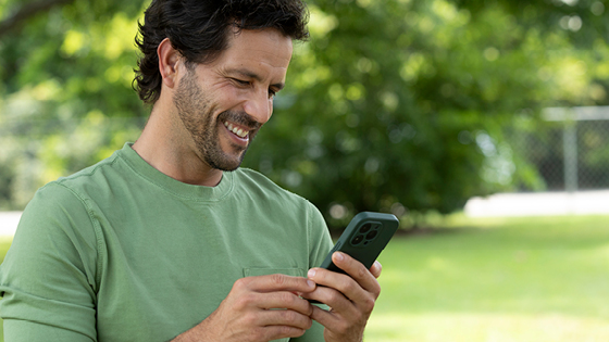 A man looking at his mobile device